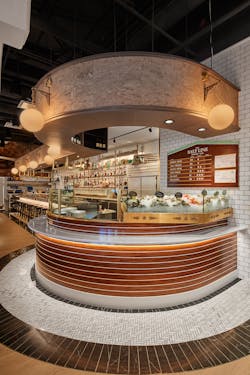 Grizform Design Architects&rsquo; Salt Line in Arlington, VA pays thoughtful homage to its New England and Chesapeake Bay-inspired design with a 1970s Chris-Craft oyster bar.