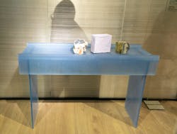 A blue glass table from Glas Italia, designed by Patricia Urquiola. A blue glass table from Glas Italia, designed by Patricia Urquiola.