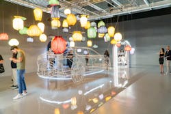 Car manufacturer Lexus&apos; installation titled, &apos;Sparks of Tomorrow,&apos; created by designer Germane Barnes, featured a floating, 3D wireframe sculpture of its electric car surrounded by colorful lighting.