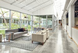 Room & Board’s headquarters feature a wraparound design that allows a gorgeous view of the center courtyard and lush vegetation from all four angles within the office. Room & Board’s headquarters feature a wraparound design that allows a gorgeous view of the center courtyard and lush vegetation from all four angles within the office.