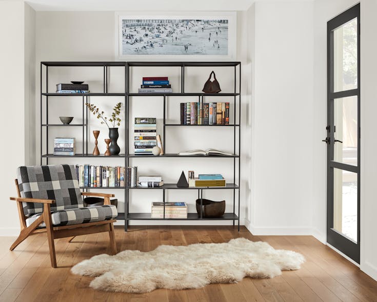 Finding furniture that allows for flexibility is also integral to the Content Room, as new projects may require different backdrops and themes. Tall shelving and bookcases like Foshay and Etting are great solutions, as they build up vertical space and provide a blank canvas for staging and swapping props.