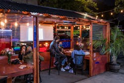 As part of its pro bono efforts to support local businesses, Design Advocates created a barrier and seating system to house outdoor dining for Tropical Rotisserie in the Bronx, NY as part of their Open Restaurants program. It served as a canvas for local artists Dexter and Felix Ciprian who used it to create an expression of Dominican identity with corrugated metal, salvaged window shades, orange paint and plexiglass offcuts. As part of its pro bono efforts to support local businesses, Design Advocates created a barrier and seating system to house outdoor dining for Tropical Rotisserie in the Bronx, NY as part of their Open Restaurants program. It served as a canvas for local artists Dexter and Felix Ciprian who used it to create an expression of Dominican identity with corrugated metal, salvaged window shades, orange paint and plexiglass offcuts.