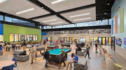 A large, open game room space anchors the project at the center, surrounded by programmed spaces along the perimeter such as classrooms, a teen lounge, a community room, a gymnasium, performing arts center and an administration wing.