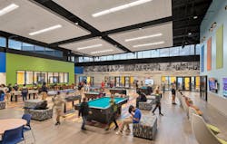 A large, open game room space anchors the project at the center, surrounded by programmed spaces along the perimeter such as classrooms, a teen lounge, a community room, a gymnasium, performing arts center and an administration wing. A large, open game room space anchors the project at the center, surrounded by programmed spaces along the perimeter such as classrooms, a teen lounge, a community room, a gymnasium, performing arts center and an administration wing.