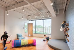 The Children's Place playroom in Kansas City, Missouri is simple with wide open space to move, lots of daylight and no overwhelming colors or patterns. The Children's Place playroom in Kansas City, Missouri is simple with wide open space to move, lots of daylight and no overwhelming colors or patterns.