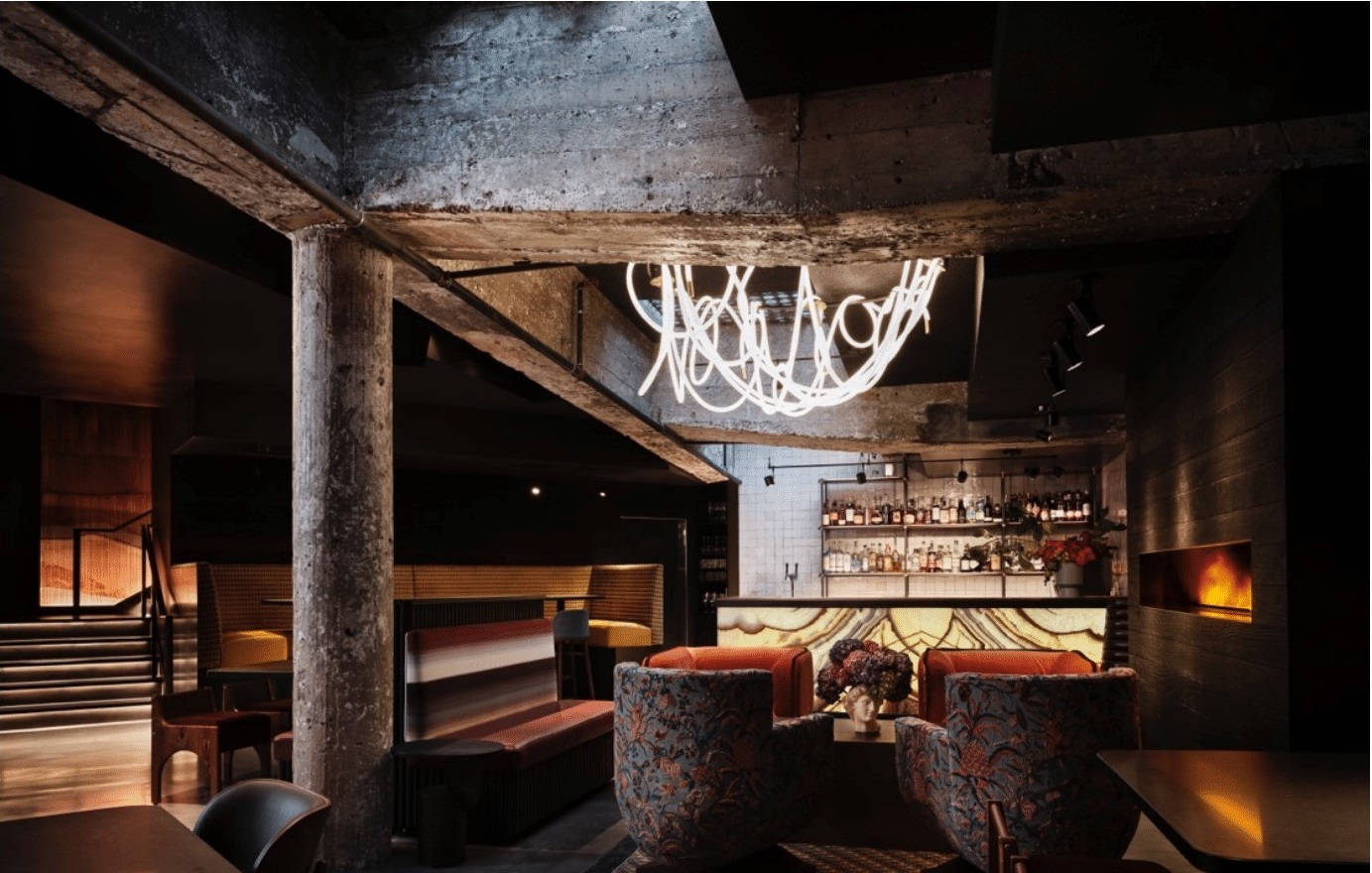 The underground Lyon & Swan supper club features a dark, sexy vibe with luxe seating that offers a view of the stage from every table.