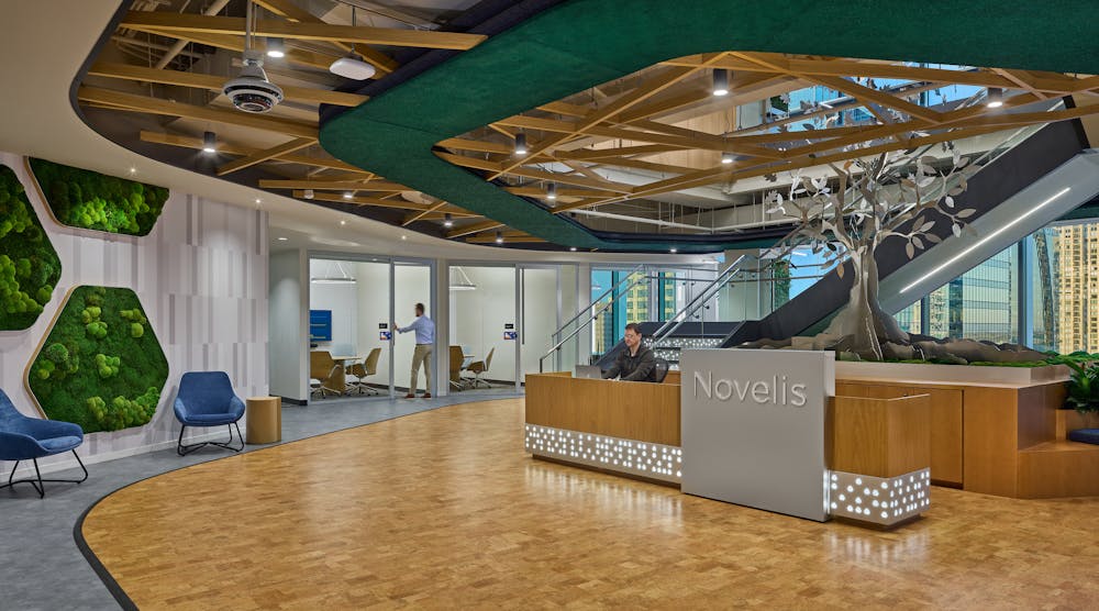 The Novelis lobby is a biophilia showcase, with cork flooring, moss walls and an aluminum tree that nods to the company&rsquo;s recycling services.