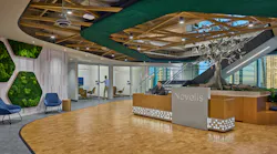 The Novelis lobby is a biophilia showcase, with cork flooring, moss walls and an aluminum tree that nods to the company’s recycling services.