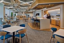 Cafes anchor each of the three floors of the Novelis headquarters, with wood as a biophilic backdrop. Cafes anchor each of the three floors of the Novelis headquarters, with wood as a biophilic backdrop.