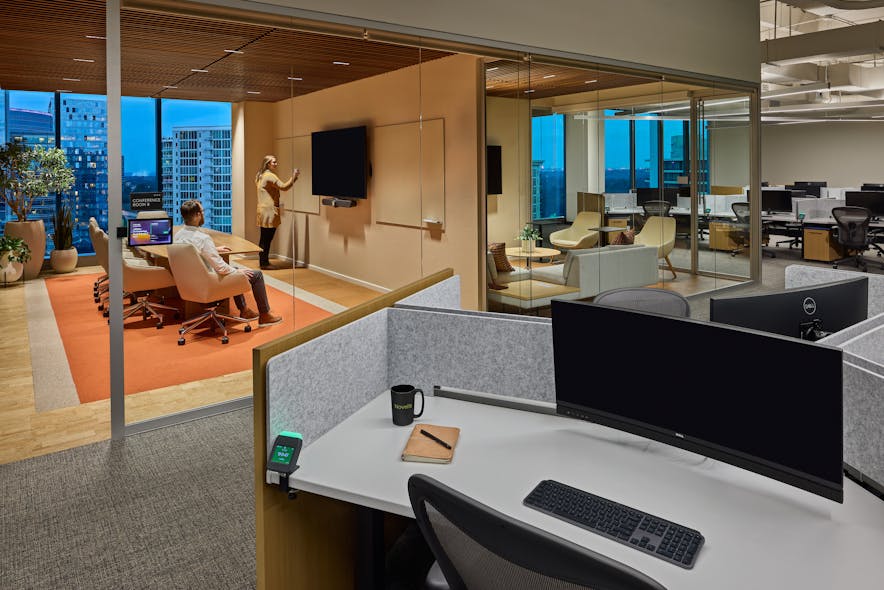 To fully embrace free address, Novelis offers flexible areas for quiet time and meetings. Biophilic touches like light wood and planters unite the open concept.