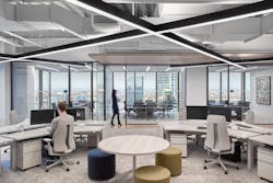The staff zone features 120-degree desks, daylighting and views, not to mention bold diagonals for lighting above that mimic the Ducera logo.
