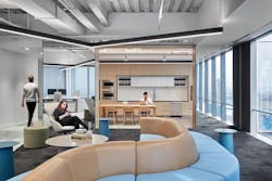 The staff kitchen opens up to a lounge with serpentine seating winding its way through to allow for more relaxed, solo or small group work and meetings. The staff kitchen opens up to a lounge with serpentine seating winding its way through to allow for more relaxed, solo or small group work and meetings.