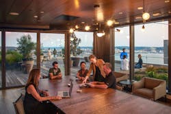 A tenant collaboration space on the roof deck with views of Elliott Bay at 2+U, Seattle, Wash.