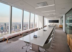 A large main boardroom can be broken down into two and frames stunning views of New York Harbor.