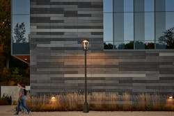 An Ashbery light illuminates a walkway.