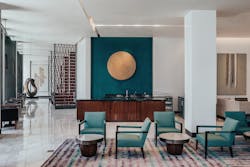 Sculptural pieces compliment paintings in both areas of Opus (a casual lounge pictured here and more formal dining room towards the back). Sculptural pieces compliment paintings in both areas of Opus (a casual lounge pictured here and more formal dining room towards the back).