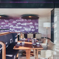 Greatly influenced by minerals and crystal throughout his F&amp;B program, Aizaki really honed in on it with Sora, the top floor Japanese restaurant. A lavender, iridescent wall with dips and grooves mimics the surfacing of precious stones.