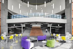 The rotunda offers a variety of seating options and collaboration spaces at the Francis Tuttle Danforth Campus. Pendant lighting illuminates the space, adjusting to the natural light shining through the clerestory windows. The rotunda offers a variety of seating options and collaboration spaces at the Francis Tuttle Danforth Campus. Pendant lighting illuminates the space, adjusting to the natural light shining through the clerestory windows.