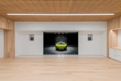 British automotive brand McLaren's 31,000-square-foot campus in Coppell, Texas, is a supercar showroom with minimalist design that features dramatic lighting and screens to put the product center stage. British automotive brand McLaren's 31,000-square-foot campus in Coppell, Texas, is a supercar showroom with minimalist design that features dramatic lighting and screens to put the product center stage.