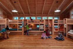 Each of the eight Sherwood cabins houses 10 campers and two counselors, featuring the same layout, all centered around a camper's bunkbed as homebase—their semi-private pod to reset whenever they need, with built-ins to hold personal items. Each of the eight Sherwood cabins houses 10 campers and two counselors, featuring the same layout, all centered around a camper's bunkbed as homebase—their semi-private pod to reset whenever they need, with built-ins to hold personal items.