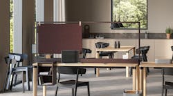 Enfold Work table with modular attributes for storage and sound absorption.