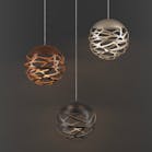 Kelly Cluster light, designed by Andrea Tosetto, is a suspension light that juxtaposes light and dark.