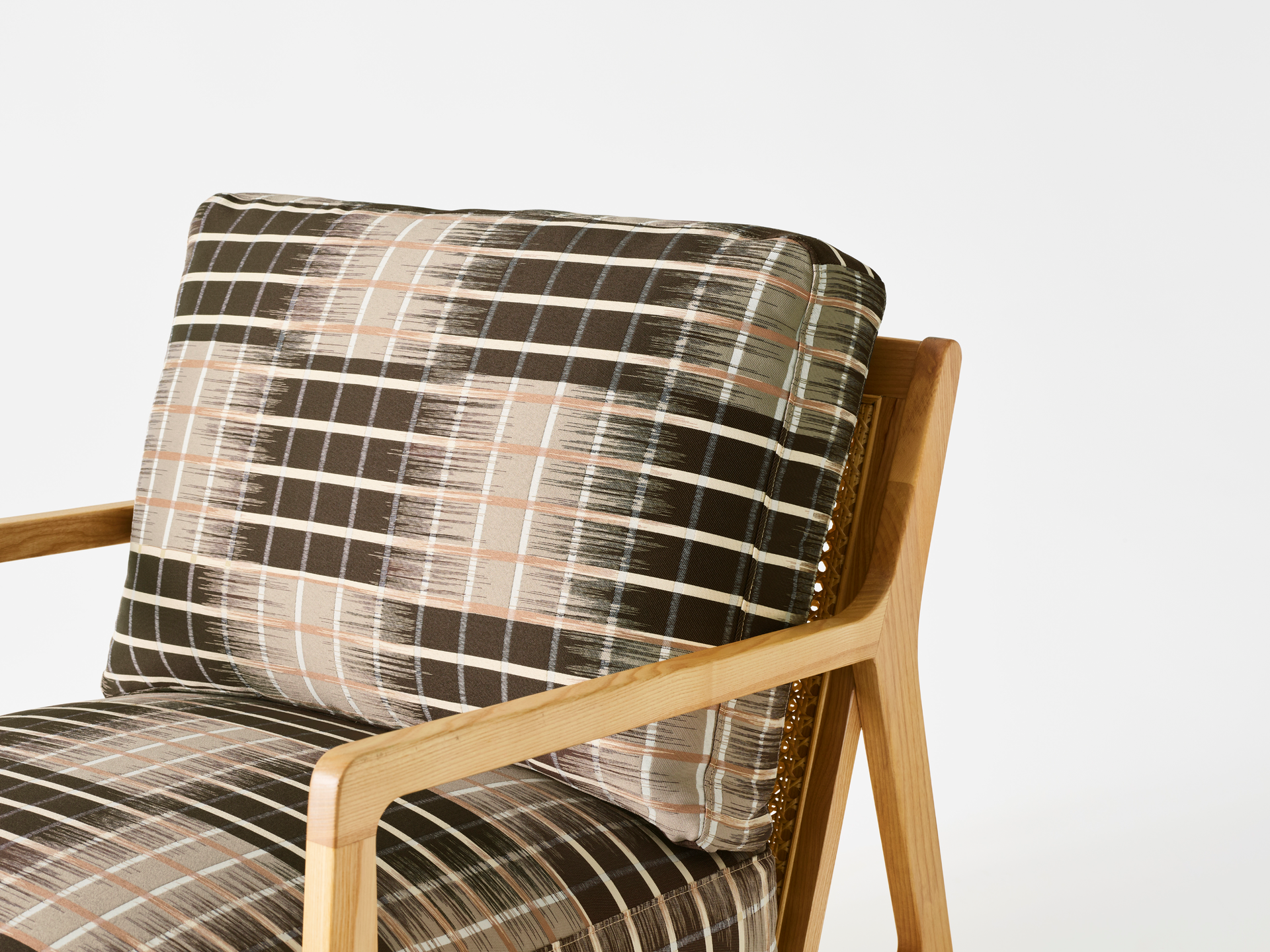 Tone fabric used to upholster a chair.