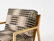 Tone fabric used to upholster a chair.
