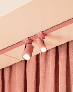 Multiverse track lighting system in dusky pink. Multiverse track lighting system in dusky pink.