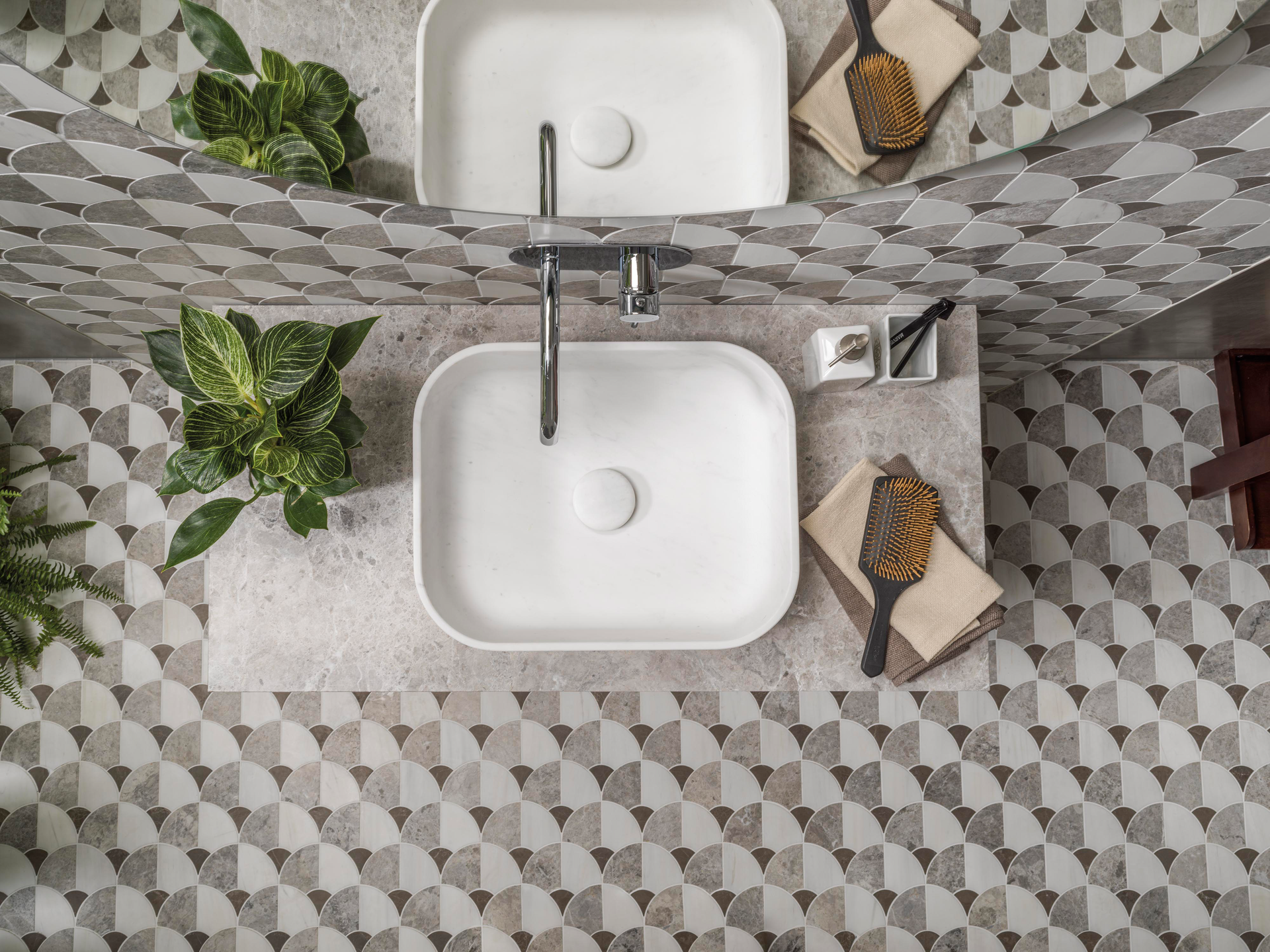 The Figure Collection in Shell Dark accents the floor and wall in this bathroom.
