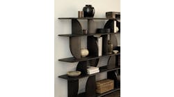 The Geometric rack is crafted in solid wood teak with a rich dark brown finish.