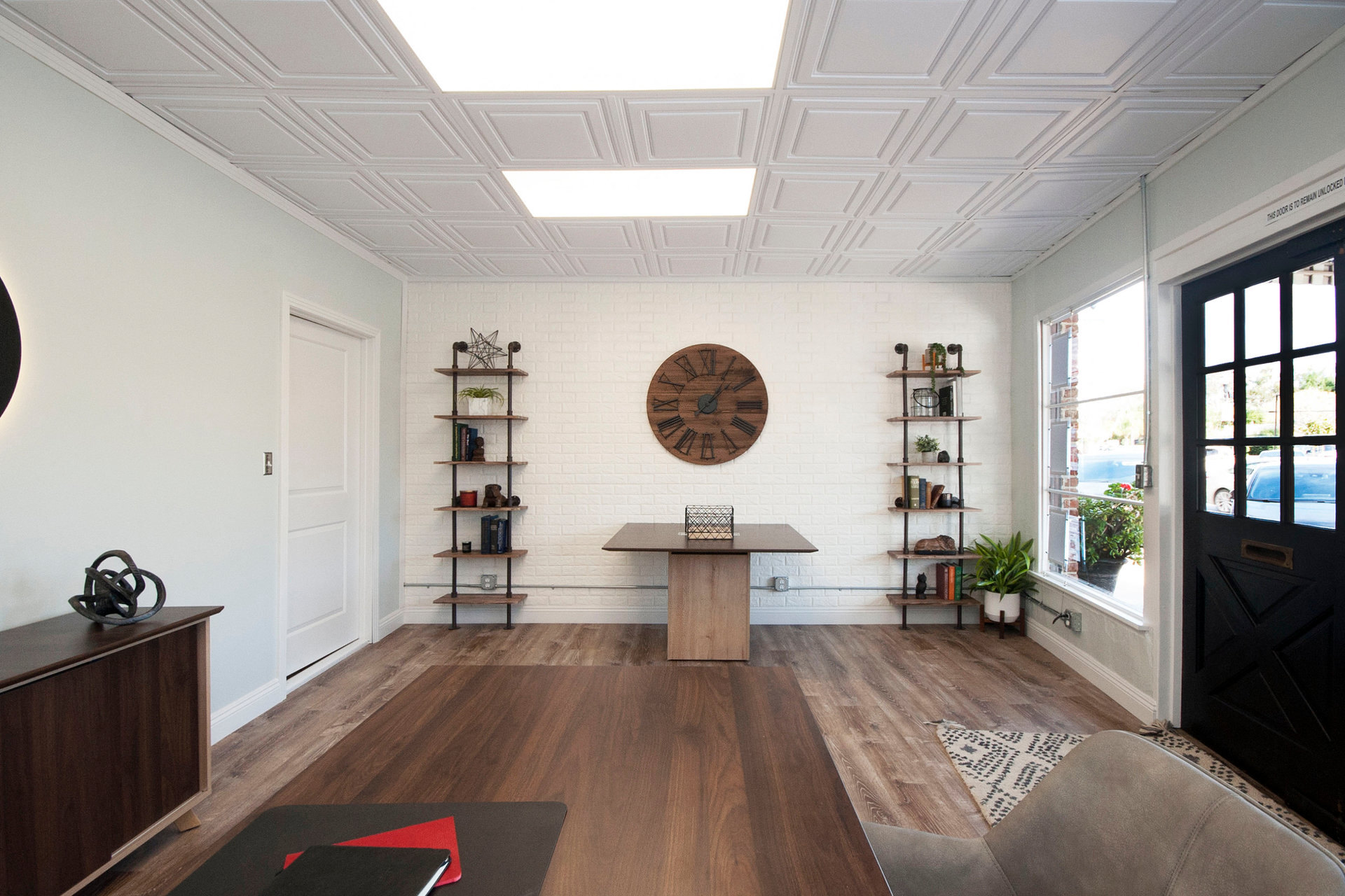Stratford ceiling tiles adorn the ceiling of the Brix Realty office.