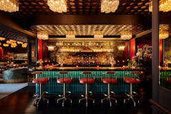 Amongst the Tin Building’s selection of themed restaurants is the Chinese House of the Red Pearl, with distinctive aqua blue tiling and upscale light fixtures. Amongst the Tin Building’s selection of themed restaurants is the Chinese House of the Red Pearl, with distinctive aqua blue tiling and upscale light fixtures.