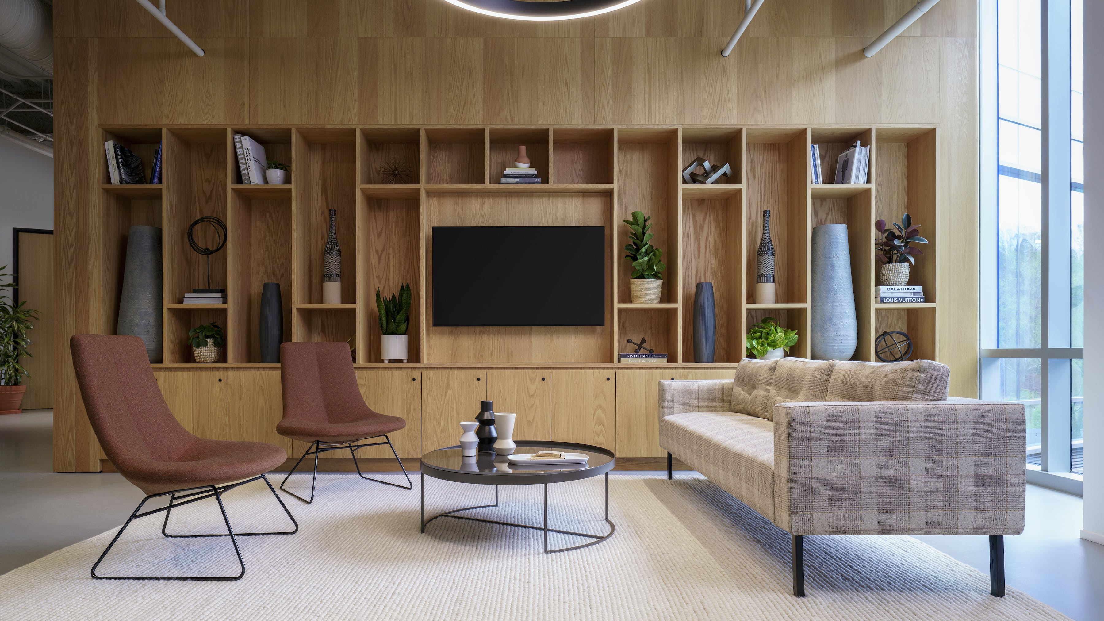 Studio TK's Pico Lounge chairs in red with metal sled bases.