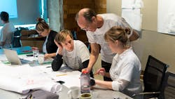 EskewDumezRipple studio members collaborate on design ideas for local nonprofit organizations in and around the New Orleans and Washington, D.C. areas during a past Martin Luther King, Jr. Day of Service. EskewDumezRipple studio members collaborate on design ideas for local nonprofit organizations in and around the New Orleans and Washington, D.C. areas during a past Martin Luther King, Jr. Day of Service.