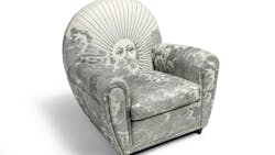The Vanity Fair XC Imagine Edition armchair from Fornasetti and Poltrona Frau.