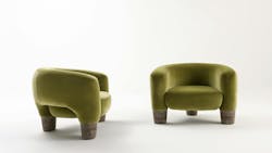 The Rialto armchair by Laurameroni has a distinct three-leg design. It is pictured in Lario 09 matt velvet.