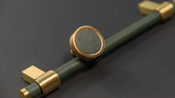 The Keeler Brass Company&apos;s Anthology Series round knob and bar pull in a royal hide evergreen.