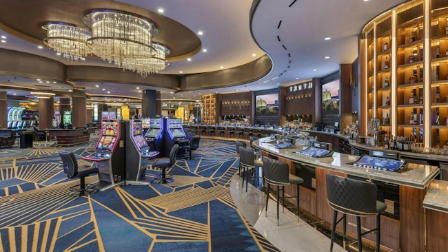 Pequot symbols are interwoven in the geometry of the carpet design at the Woodlands Casino at Foxwoods, honoring Mashantucket Pequot Tribe’s history as the owner and operator of the world’s largest casino resort in rural Mashantucket, Conn.