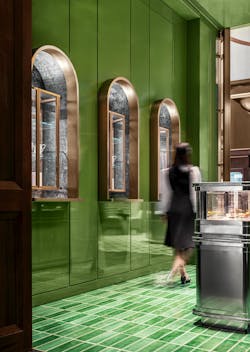 Display cabinets feature French-style curved lines and are inspired by jewelry boxes, building up the pastries as curated pieces of art.