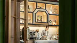 The custom bar counter and shelving backdrop can serve host to private events such as baking and floral design classes.