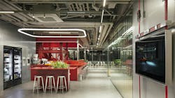 The KRAFTON PUBG headquarters in Seoul features exposed ceilings to increase ceiling height, create an industrial look and offer acoustical relief. The coffee area serves as a barrier between the staircase and the workspaces. The KRAFTON PUBG headquarters in Seoul features exposed ceilings to increase ceiling height, create an industrial look and offer acoustical relief. The coffee area serves as a barrier between the staircase and the workspaces.