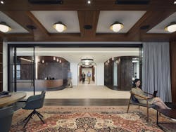 Sophisticated and welcome, the law firm’s entryway greets employees and clients with locally referenced materials like wood, stone and dark metals. Sophisticated and welcome, the law firm’s entryway greets employees and clients with locally referenced materials like wood, stone and dark metals.