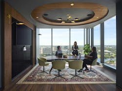 In a prominent corner office with two sides of floor-to-ceiling windows showcasing the Austin skyline, a touch of greenery complements this collaborative meeting area. In a prominent corner office with two sides of floor-to-ceiling windows showcasing the Austin skyline, a touch of greenery complements this collaborative meeting area.