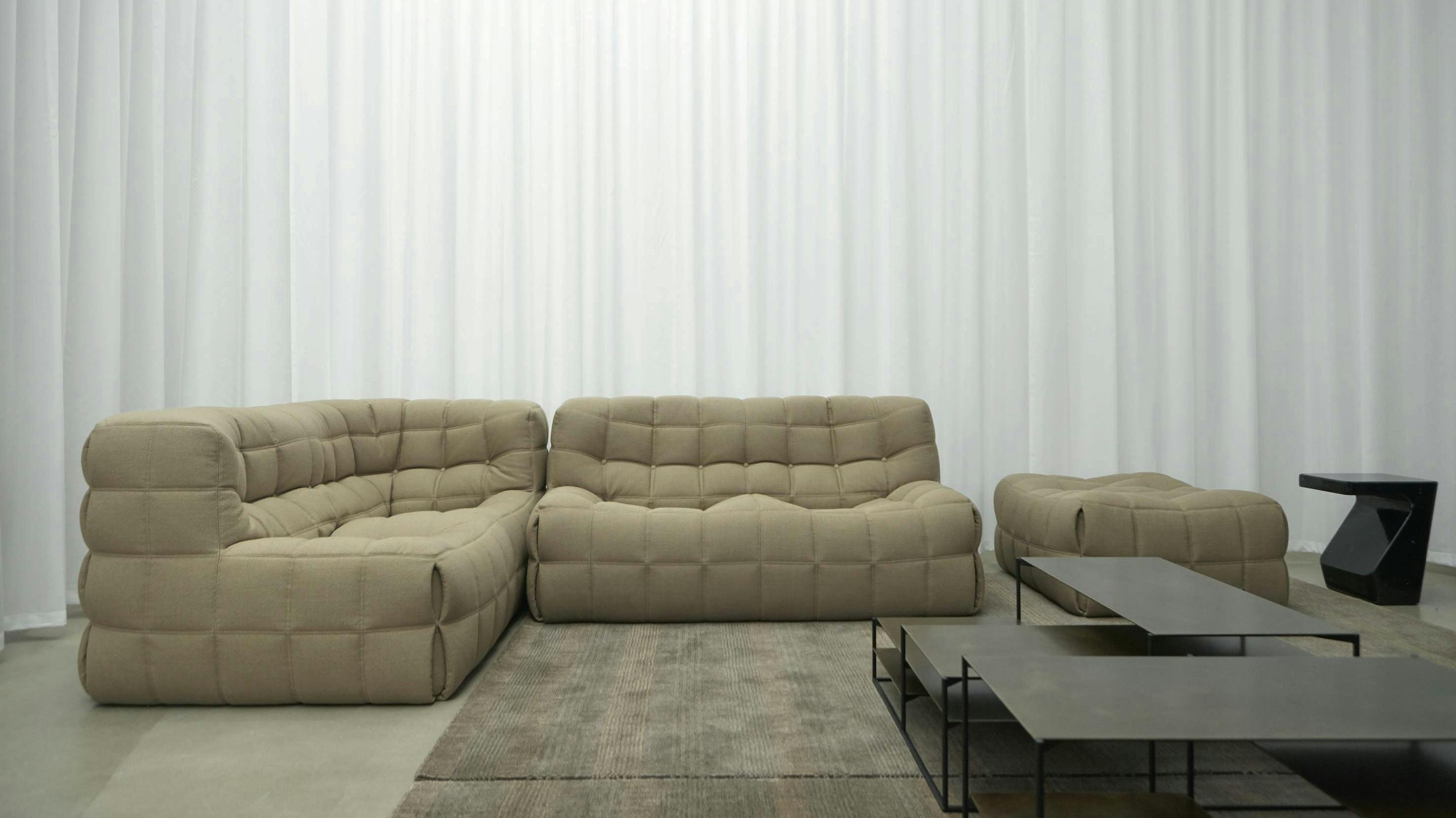 Ligne Roset's Kashima couch features quilted all-foam seating and rounded and curved lines for classic 'English' comfort.