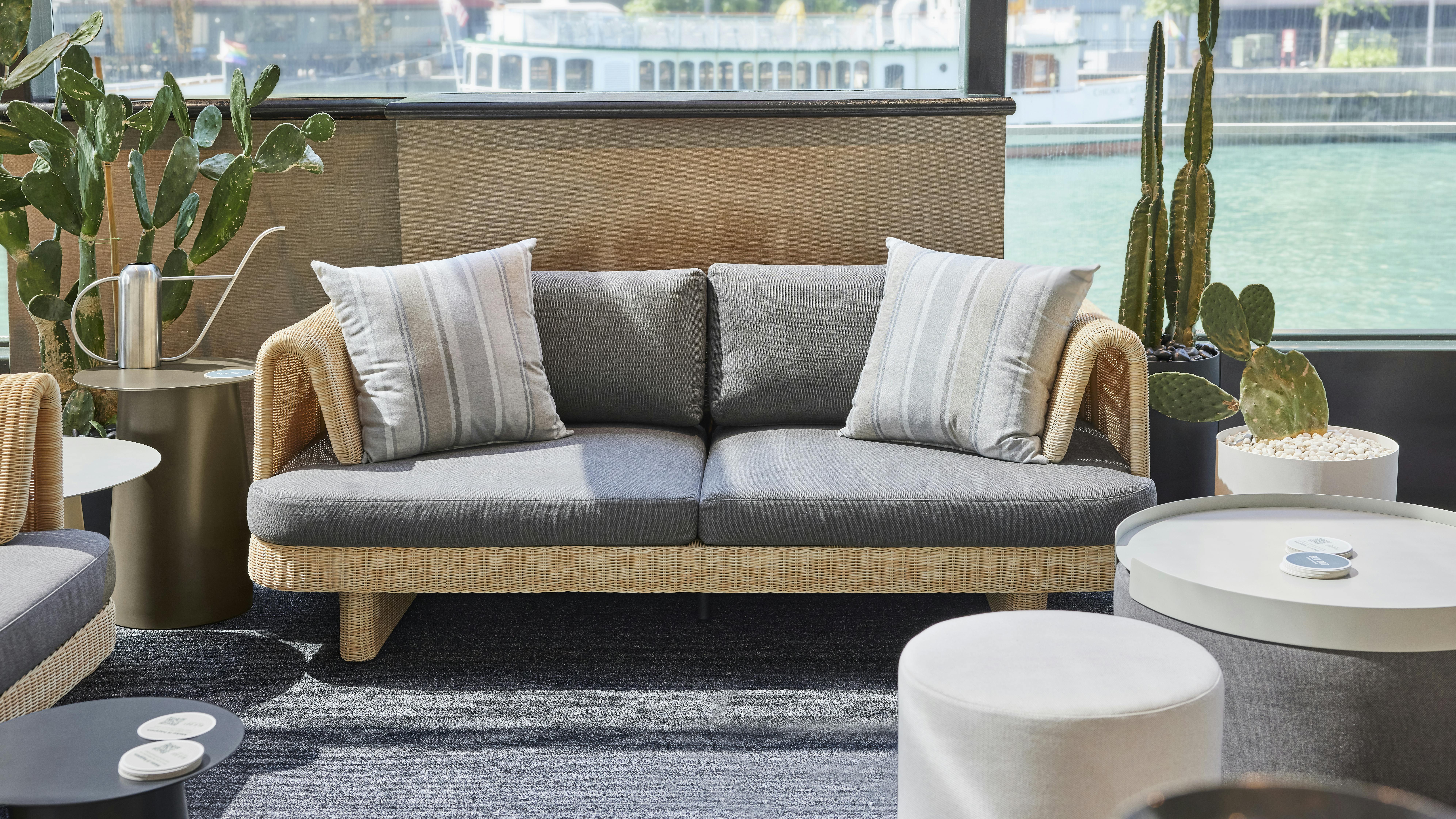 The Loophole Outdoor 2 Seat Sofa by Blu Dot has a low-profile frame.