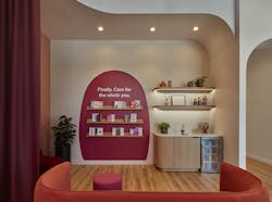 At this Culver City, Calif., location, the living room/waiting area is designed with soft white with pink undertone walls, hot pink accents, and dramatic plum-colored curtains. At this Culver City, Calif., location, the living room/waiting area is designed with soft white with pink undertone walls, hot pink accents, and dramatic plum-colored curtains.