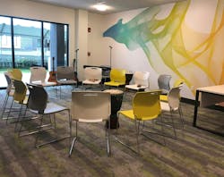 Splashes of color among relaxing neutrals, along with soundwave-inspired wall art, brightens a music therapy room at a Skyland Trail facility. Splashes of color among relaxing neutrals, along with soundwave-inspired wall art, brightens a music therapy room at a Skyland Trail facility.