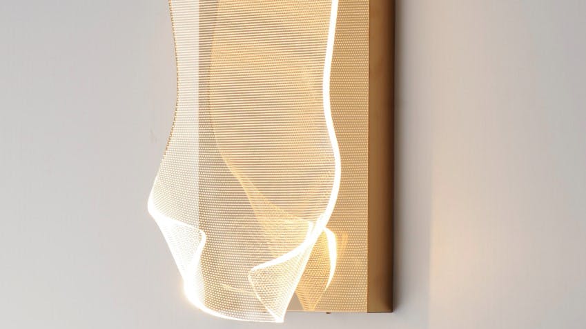 Rinkle pendants have abstract forms shaped from sheets of transparent acrylic illuminated by LEDs.