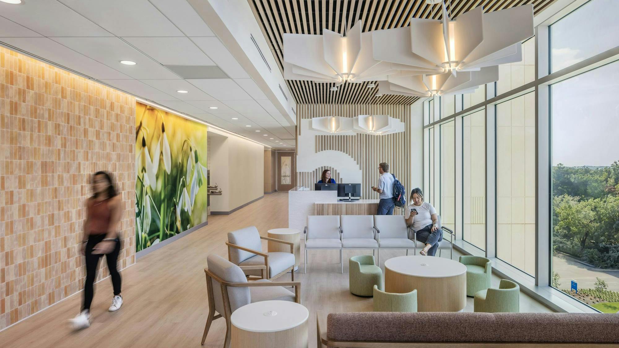 The interior of each building at the Baptist Hospital Brent Lane campus takes cues from the exterior design, using handcrafted materials, such as wood, bronze and terrazzo, to create a warm, welcoming environment for patients, their loved ones and staff members.